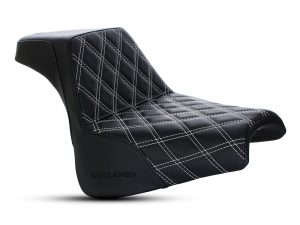 Black leather motorcycle seat with diamond stitching for motorbike comfort and style.