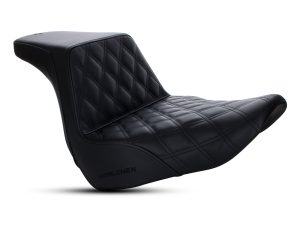 Leather motorcycle seat with quilted design for Harley Davidson bikes.