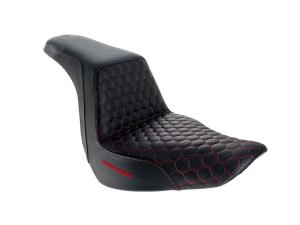 Premium black motorcycle seat with red hexagon stitching for Rebelry Motorcycles enthusiasts.