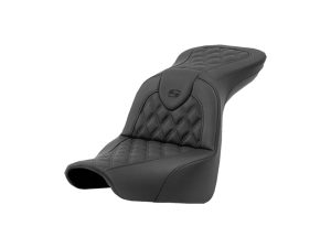 Leather motorcycle seat with quilted stitching for comfort and style.