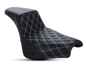 Saddlegmen motorcycle saddle with quilted black leather and white stitching for Revelry Motorcycles enthusiasts.