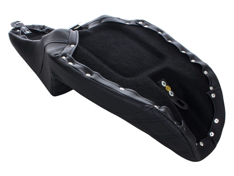 Black motorcycle seat with leather stitching and mounting hardware for Revelry Motorcycles.