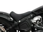 Black cruiser motorcycle seat and engine components, showcasing sleek design and high-quality craftsmanship.