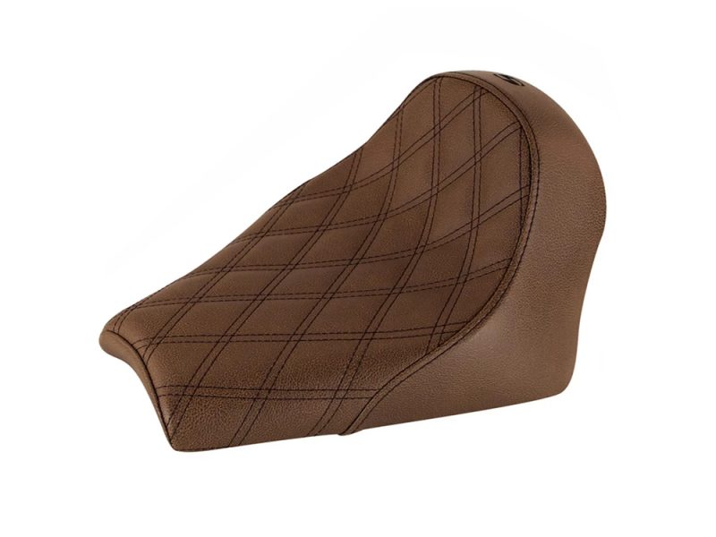 Vintage brown leather motorcycle seat with quilted stitching for Revelry Motorcycles enthusiasts.
