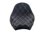 Vespa motorcycle seat with quilted black leather and white stitching for comfort and style.