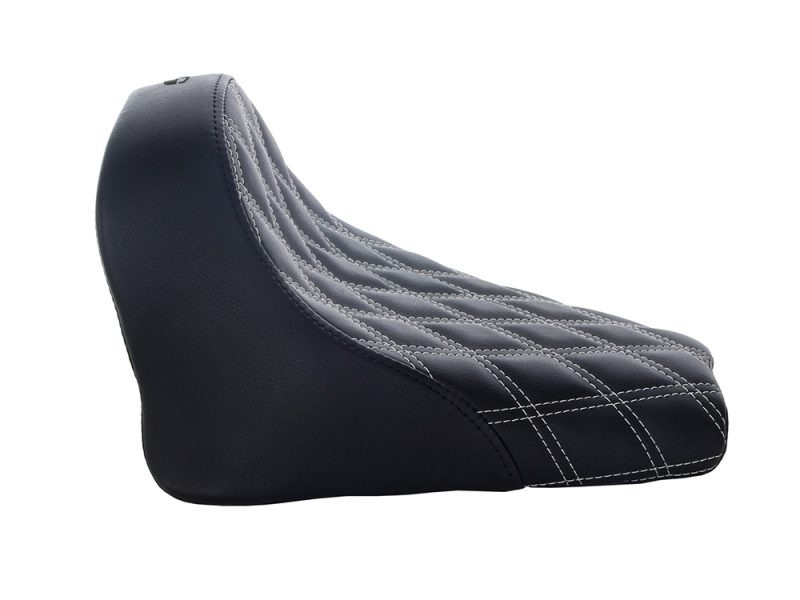 Stylish black motorcycle seat with quilted stitching, ideal for custom bikes.