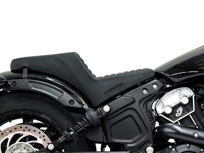 V-Twin motorcycle seat and engine parts in black, showcasing custom motorcycle accessories.