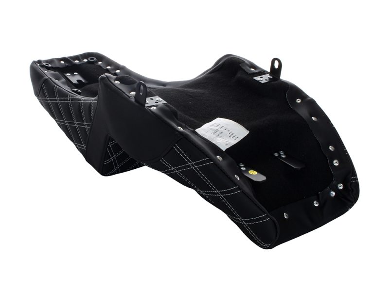 Alto motorcycle seat with black quilted design, metal rivets, and leather accents.