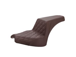 Vintage brown motorcycle seat with quilted leather upholstery, designed for Harley-Davidson bikes.