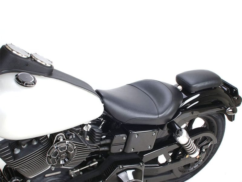 Sleek black and white custom motorcycle seat with vintage-inspired design for Harley Davidson bikes.