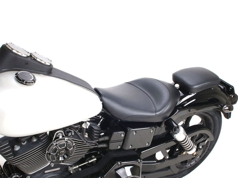 Black motorcycle seat and fuel tank with sleek design, perfect for cruiser bikes.