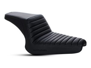 Comfortable black motorcycle seat with ribbed design for Harley Davidson bikes.