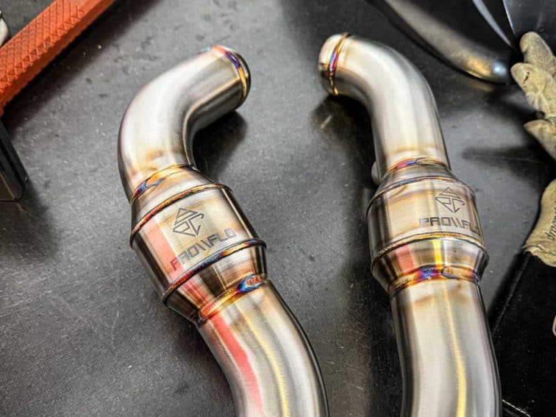 High-performance motorcycle exhaust pipes for Revelry Cycles enthusiasts.