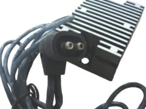 High-performance motorcycle electronic component with wiring and cooling fins for Revelry Motorcycles.