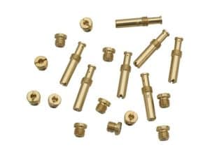 Brass motorcycle fastening bolts and screws for bike assembly and maintenance.