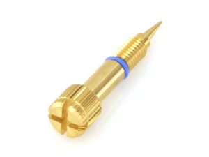 Gold tattoo needle with blue ring for tattooing and body art.