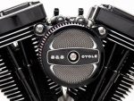 V-twin motorcycle engine with S&S Cycle branding, chrome finish, and detailed parts.