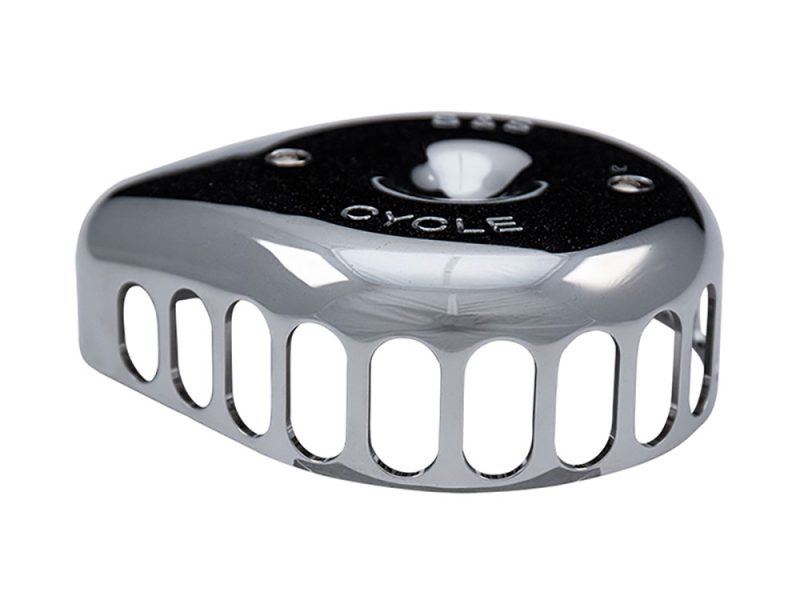 Chrome motorcycle headlight cover with vented design for Revelry Motorcycles.