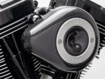 High-performance motorcycle engine with carbon fibre and advanced engineering.