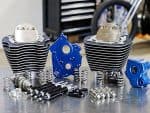 High-performance motorcycle engine parts including cylinders and pistons for Revelry Motorcycles.