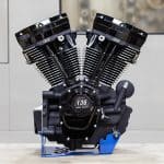 V-twin motorcycle engine with black and chrome finish, 136 cubic inches capacity.