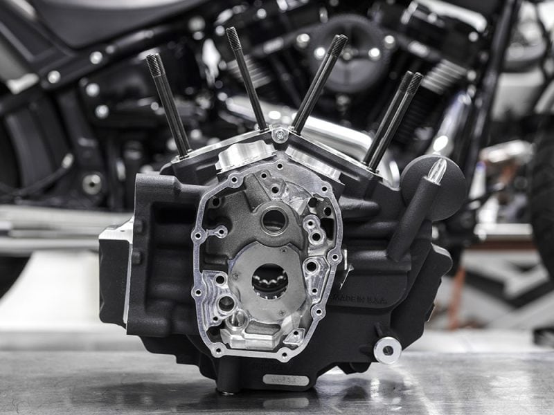 High-performance motorcycle engine block on workbench at Revelry Motorcycles, Melbourne.