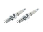 Spark plug pair for motorcycle engine replacement, high-performance bike parts.