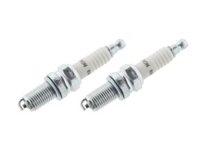 Spark plug pair for motorcycle engine replacement, high-performance bike parts.
