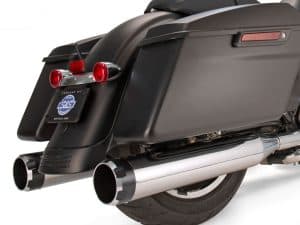 High-quality black motorcycle saddlebag with chrome exhaust pipes, perfect for touring bikes.