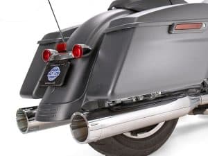Sleek black motorcycle saddle bags with chrome exhaust pipes.