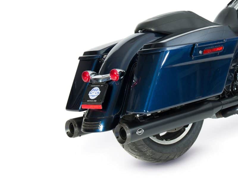 High-performance motorcycle exhaust system with saddlebag storage for Revelry Motorcycles.
