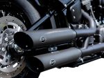 Sleek black motorcycle exhaust pipes with "S&S" logo for custom Harley Davidson bikes.