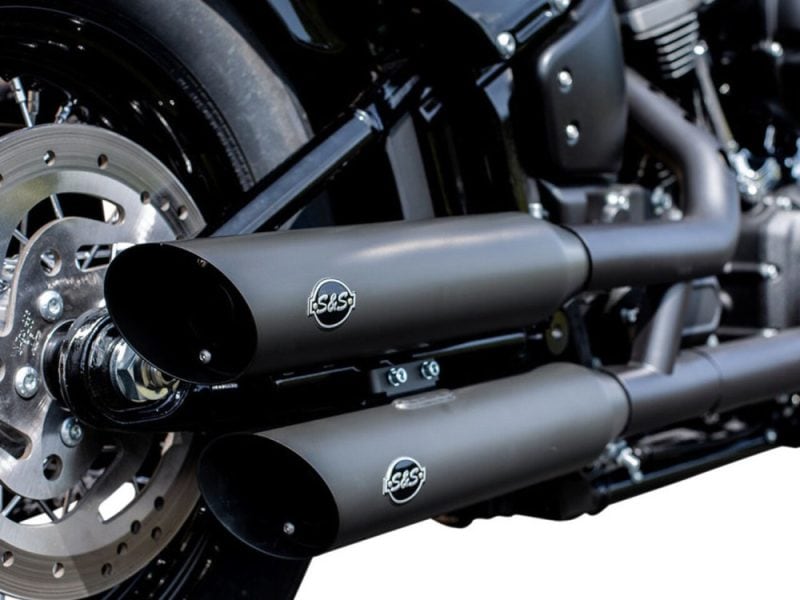 Sleek black motorcycle exhaust pipes with "S&S" logo for custom Harley Davidson bikes.