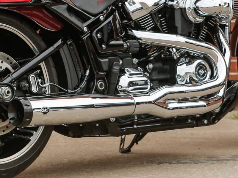 High-performance Harley-Davidson motorcycle engine with chrome exhaust system, perfect for enthusiasts.
