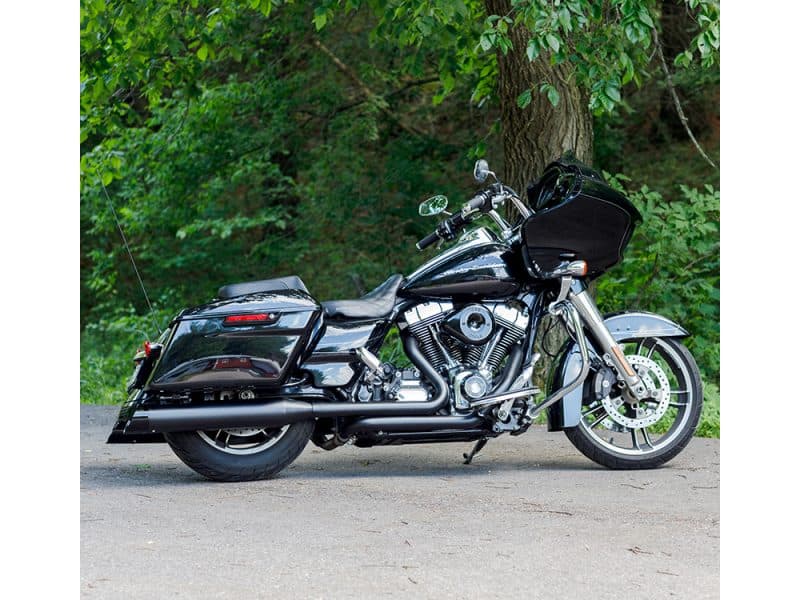 4-1/2in. Mk45 Slip-On Mufflers - Black with Black Cutlass End Caps. Fits Touring 1995-2016. Black touring motorcycle with saddlebags and fairing, ideal for long-distance riding.