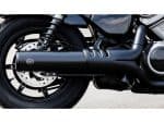 S&S exhaust system on cruiser motorcycle with black engine components and tyre.