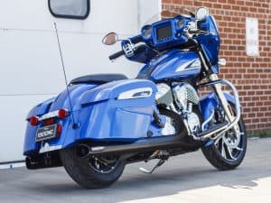 Blue Indian Motorcycle with saddlebags at Revelry Motorcycles, showcasing premium motorcycle accessories and custom bikes.