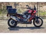 Adventure motorcycle with rugged design and storage boxes for touring and off-road riding.