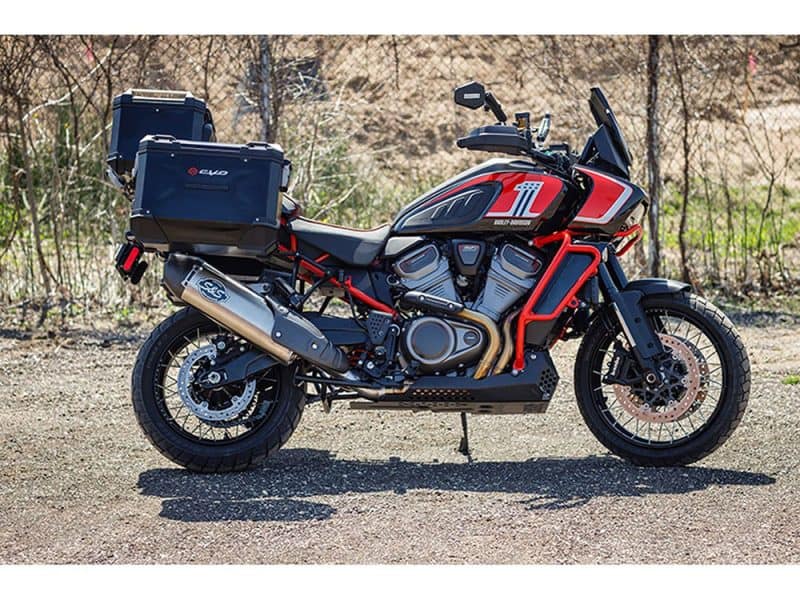 Adventure motorcycle with rugged design and storage boxes for touring and off-road riding.