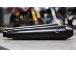 High-quality black motorcycle exhaust silencer by S&S Cycles for custom Revelry Motorcycles.