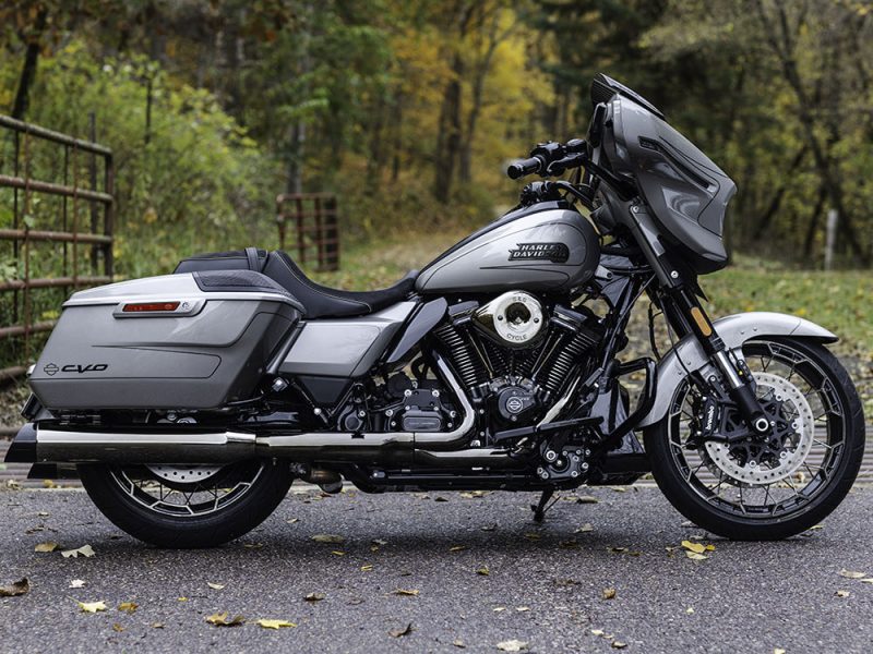 Harley Davidson touring motorcycle in silver with black accents, ideal for long-distance rides and style.