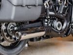 High-performance motorcycle exhaust system with sleek black and chrome finish.