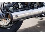 High-performance motorcycle exhaust system with sleek chrome finish for Revelry Motorcycles enthusiasts.