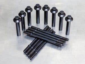 High-quality black motorcycle bolts and screws for custom bike building and repairs.