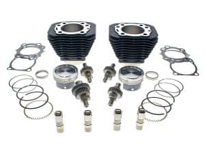 High-performance motorcycle engine rebuild kit with pistons, rings, gaskets, and bearings for Harley Davidson bikes.