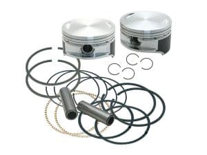 Piston and piston ring set for motorcycle engine repair, high-performance engine components.