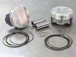 Engine piston and internal components for motorcycle rebuilds, high-performance parts by Revelry Motorcycles.