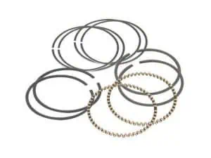 Assorted black and gold hair ties and elastic bands for motorcycle gear accessories.