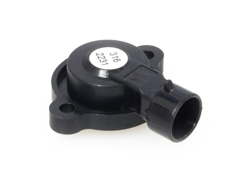 Black motorcycle ignition switch with key tag for Revelry Cycles bikes.