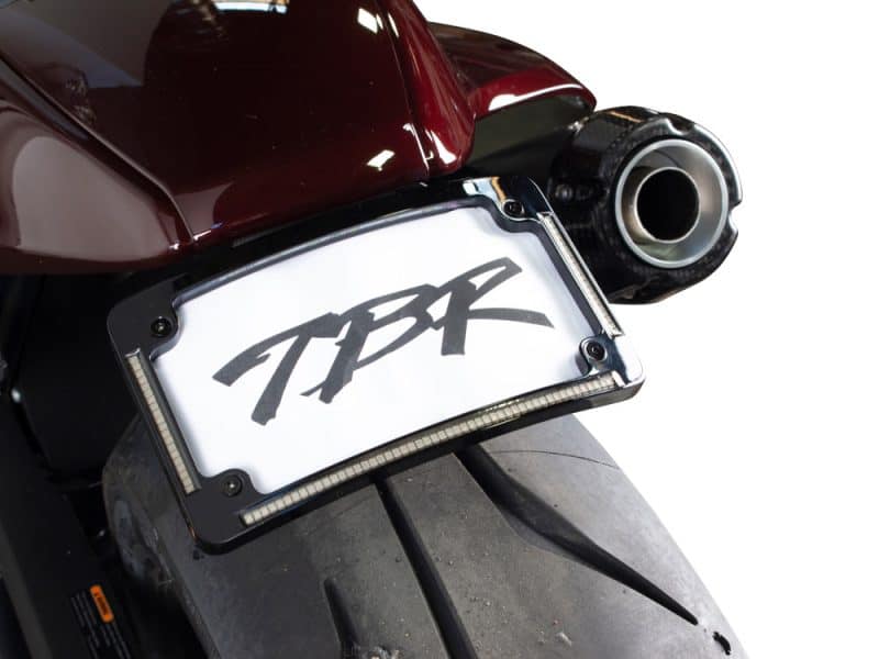 Tail Tidy Fender Eliminator Kit - Black with Run Racing motorcycle tail with TPR branding and exhaust system, close-up shot.